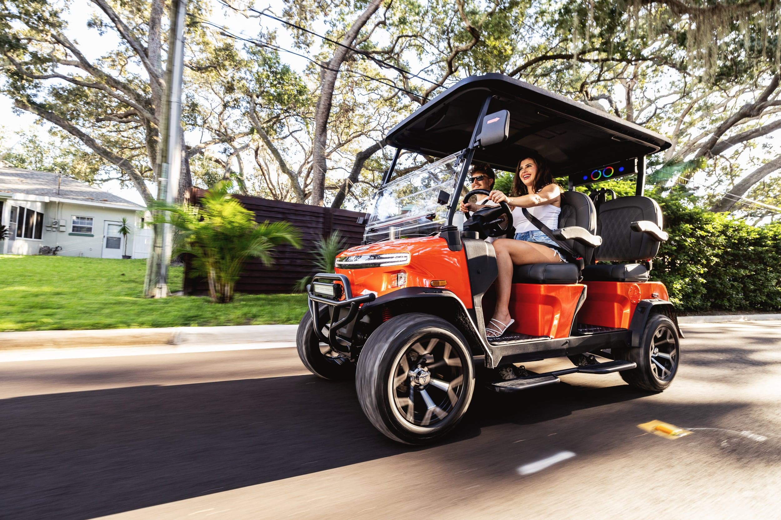 Happy customers with their new golf cart